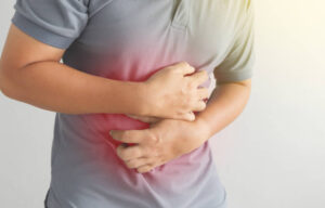 how to sleep with a stomach ulcer
